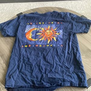 multicolored “fruit of the loom” tee size medium